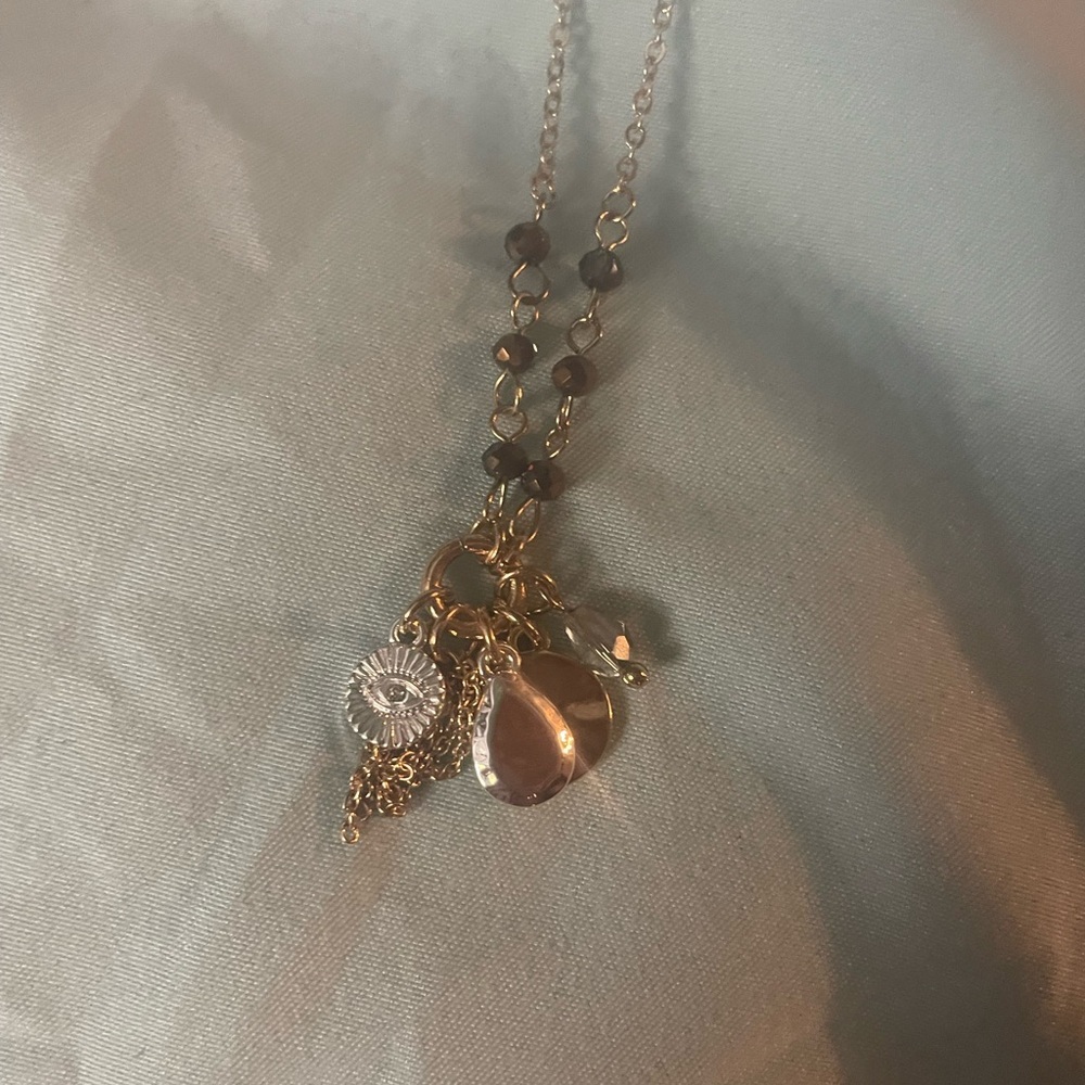 Elegant Gold and Silver Charm Necklace